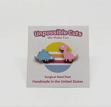 Load image into Gallery viewer, Unpossible Cuts Brontosaurus & Stegosaurus Dinosaur Handmade Stud Earrings