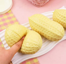 Laden Sie das Bild in den Galerie-Viewer, Jumbo Peanut Squishy Toy – Slow Rising Sensory Stress Relief Fidget
