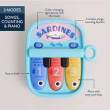Load image into Gallery viewer, Itzy Ritzy Bitzy Tunes™ Sardines – Light-Up Interactive Piano Toy
