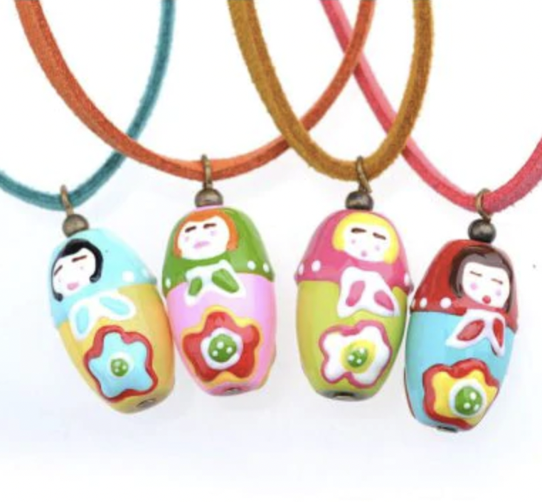 Peppercorn Kids Necklace Babushka Doll Charm Orange